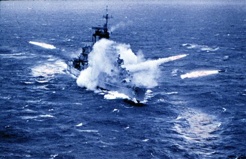 USS_Albany_(CG-10)_firing_missiles_1963_(colour).jpg